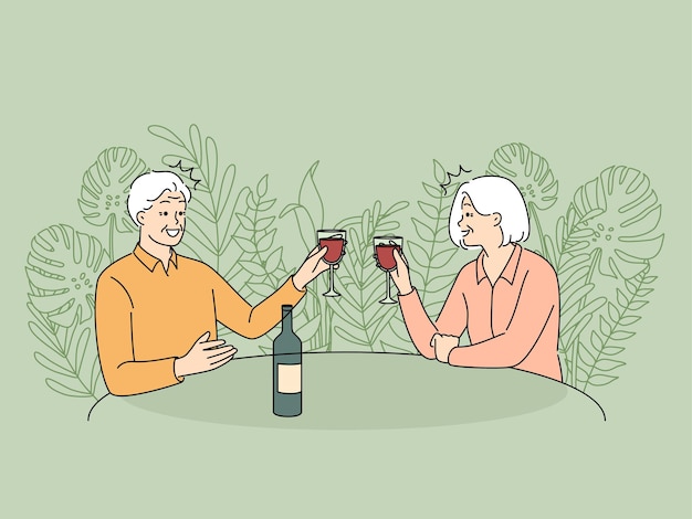 Elderly couple drinking wine in restaurant