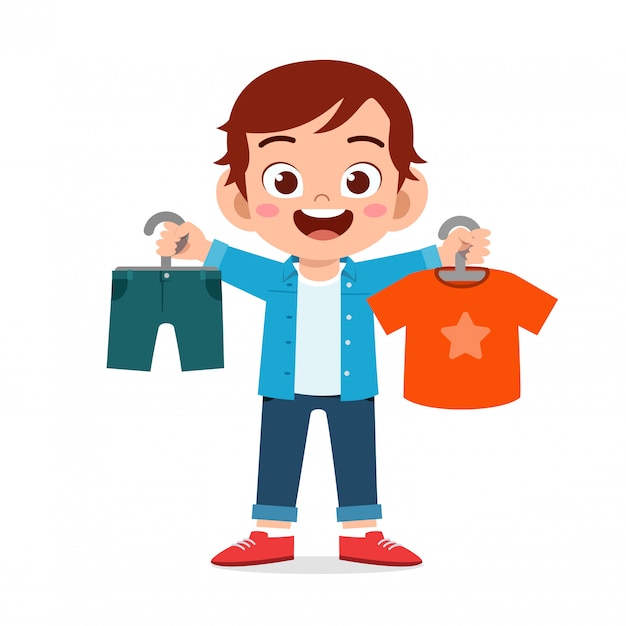 Happy cute little kid boy choose clothes