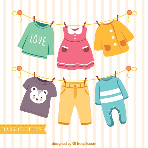 Vector nice baby clothes hanging on a rope