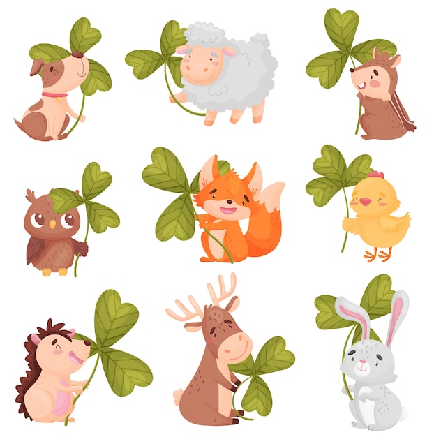 Set of cute animals with clover