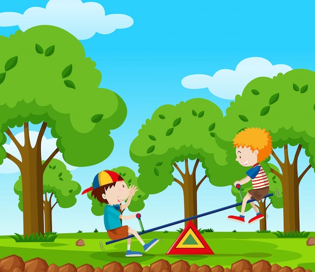 Two boys playing seesaw in the park