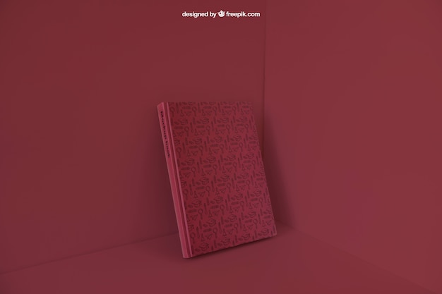 PSD gratuit livre appuyé dans un coin avec un effet de couleur rouge