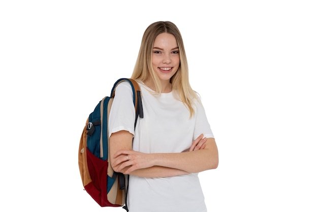 Portrait en studio de jeune adolescente étudiante avec sac à dos