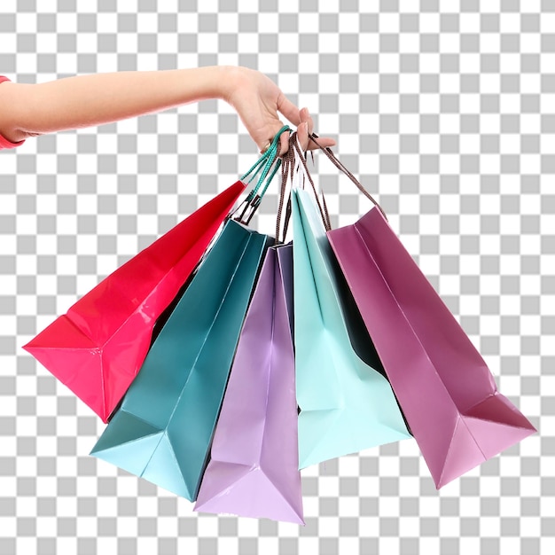 Bolsas de compras coloridas na mão isoladas em um fundo transparente