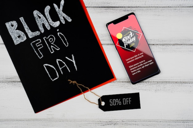 Concetto di Black Friday con smartphone mock-up