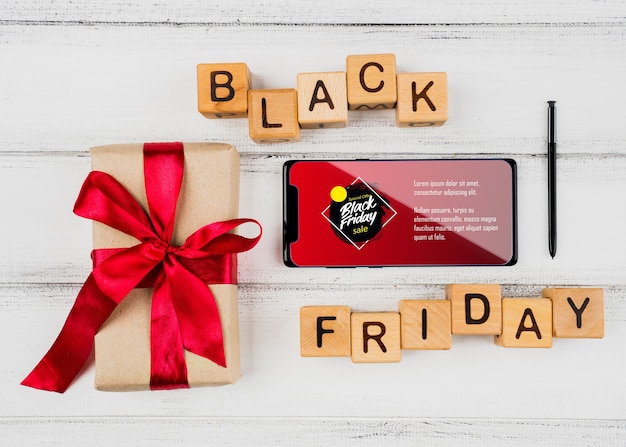 Concetto di Black Friday con smartphone mock-up