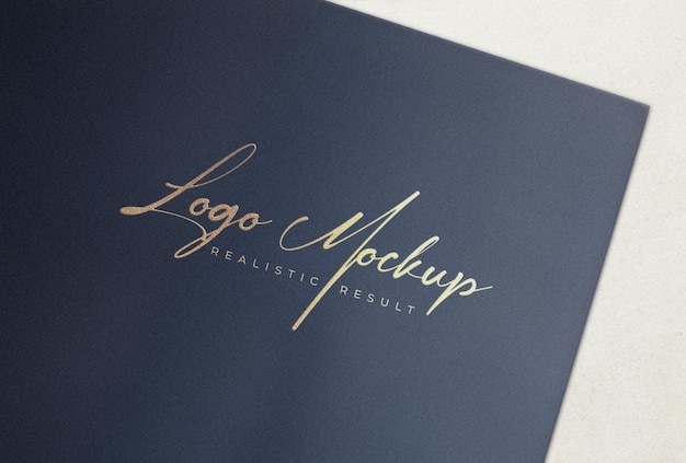 PSD logo mockup logo imprimé doré sur papier noir