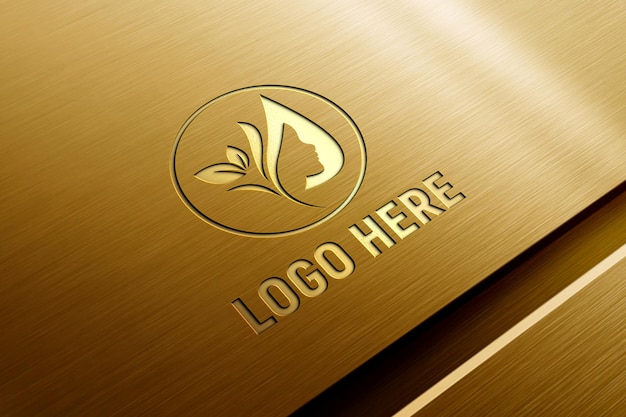 PSD modelo de logotipo 3d em relevo em painel de metal dourado