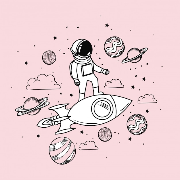 L&#39;astronaute dessine avec une fusée et des planètes