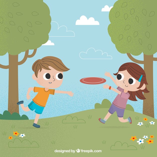 Enfants jouant au frisbee dans le parc