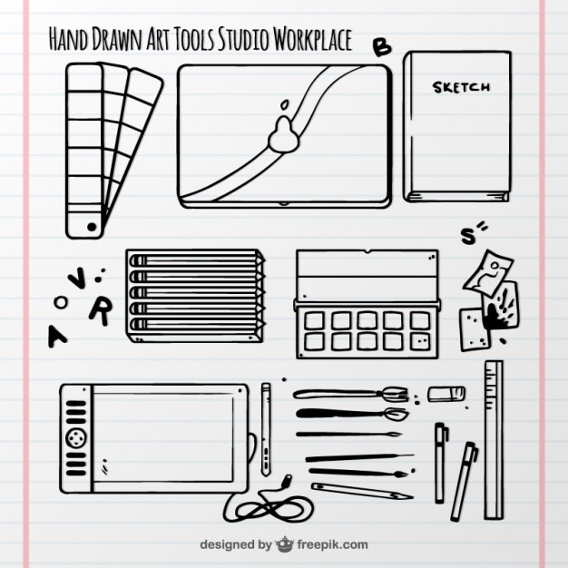 Vetor grátis estúdio de arte elementos desenhados à mão em um bloco de notas