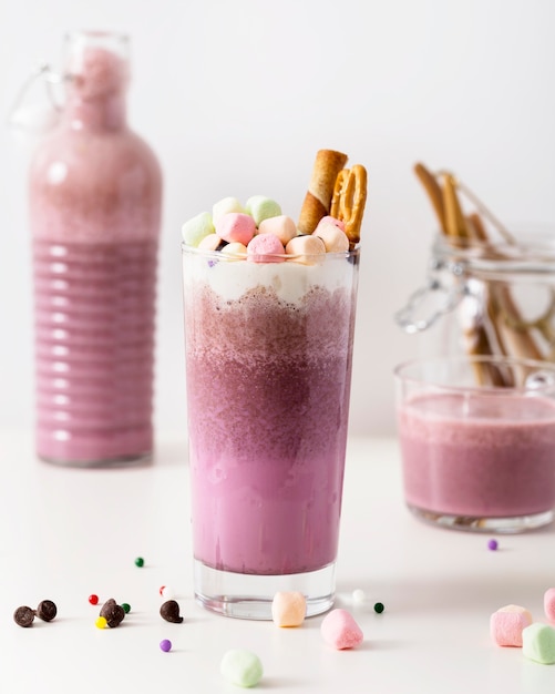 Gratis Foto roze milkshakes van de close-up