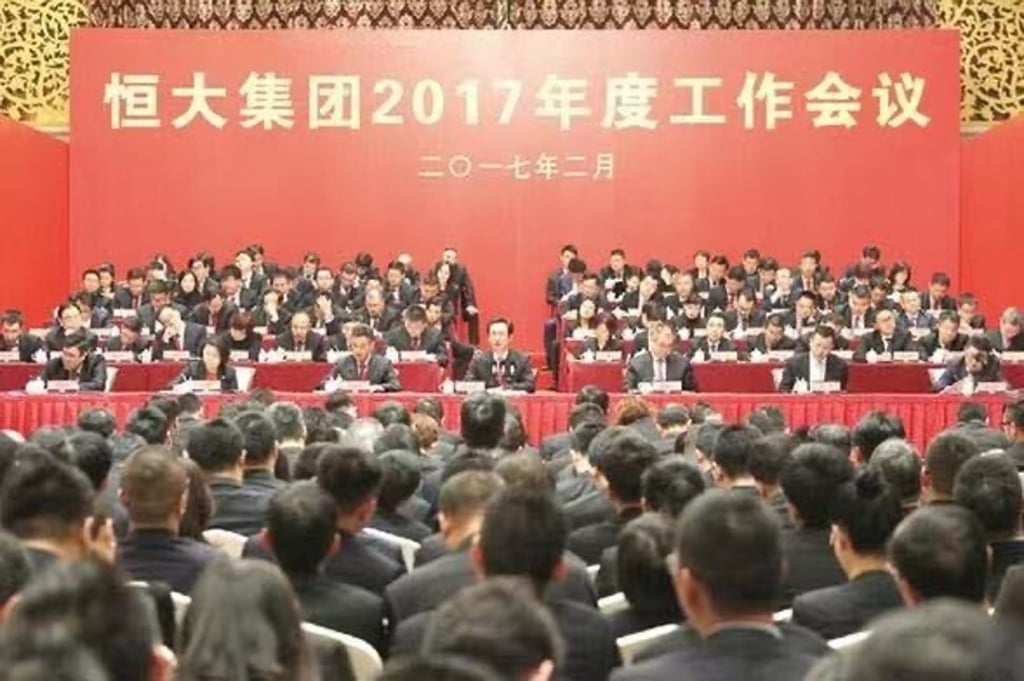 Hui Ka-yan (centre) chairing a staff meeting on February 13, 2017 in Guangzhou, where he laid out a three-year growth and diversification plan for China Evergrande Group to achieve 1 trillion yuan in sales by 2020. Photo: Xinhua