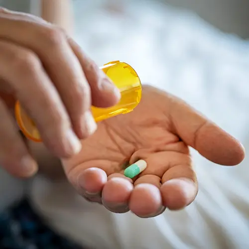 photo of pills in hand