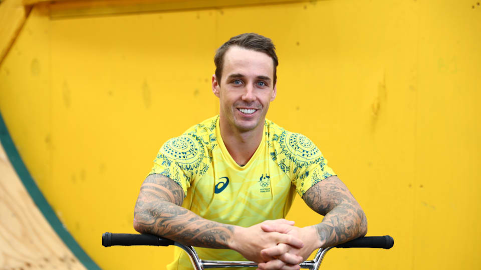 Logan Martin models Australia's Paris 2024 uniform