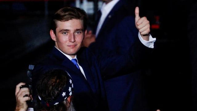 Barron Trump fist pumps 