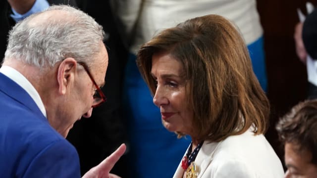 Chuck Schumer talking to Nancy Pelosi. 