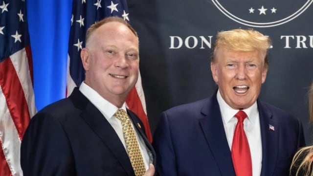 A photo of Michigan Rep. Matt Maddock and Donald Trump