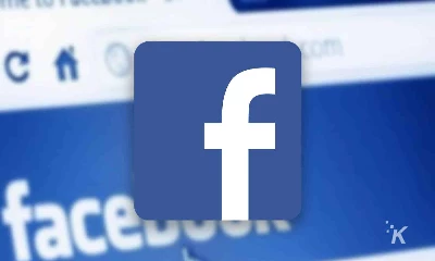 facebook logo with blurred facebook website in background