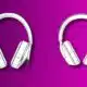 Two stylized drawings of headphones against a purple background, one on each side, with schematic-like detailing and dates "1802" and "1804" on the bands.