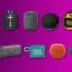 Variety of portable wireless speakers on purple background.