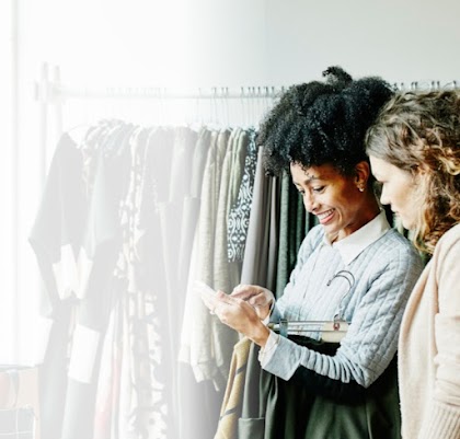 Two women at dress shop