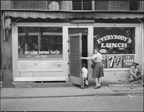 Welch is the shopping and entertainment center for the nearby mining camps. Welch, McDowell County, West Virginia. | by U.S. National Archives