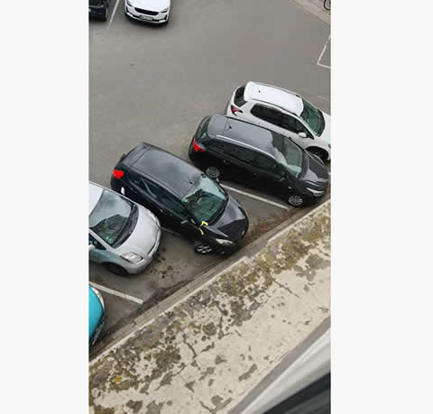 Driver Makes Several Attempts to Escape Parking Spot