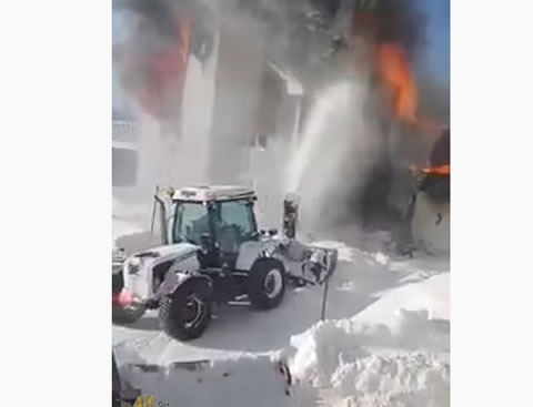 snow clearing crew extinguish fire by blowing snow