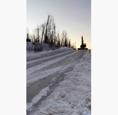 Sliding a Backhoe Down an Icy Road