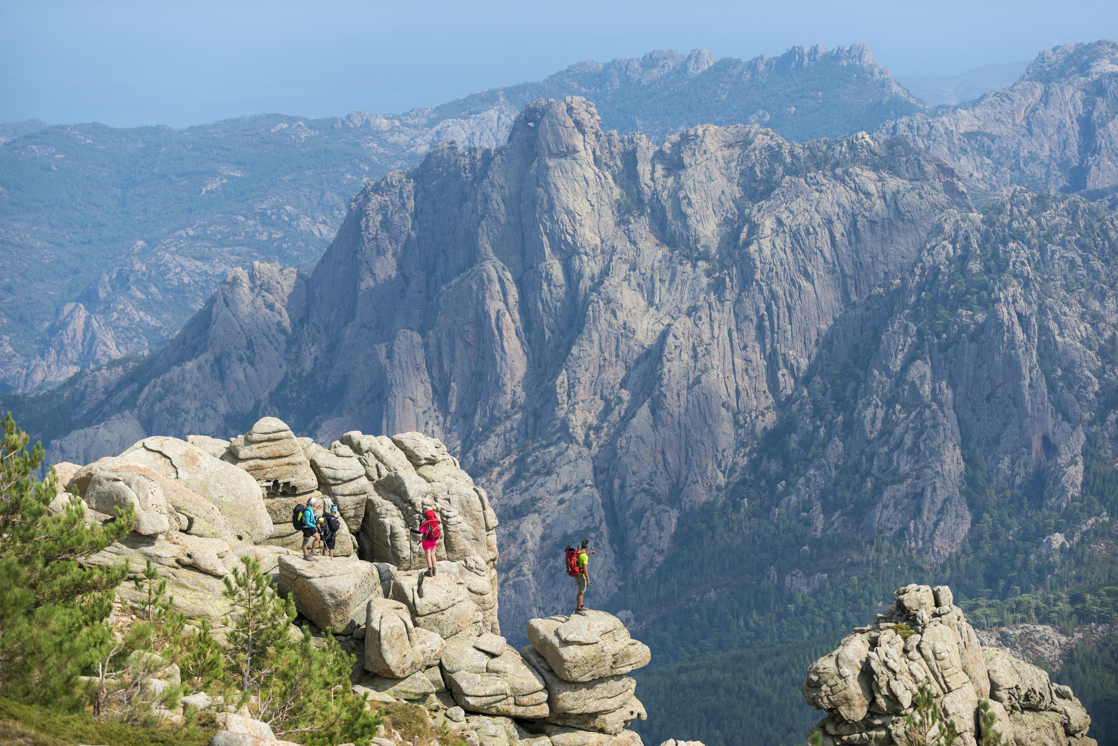 Trekking on the GR20 trail in Corsica near the Aiguilles de Bavella hiking towards Refuge d'Asinao