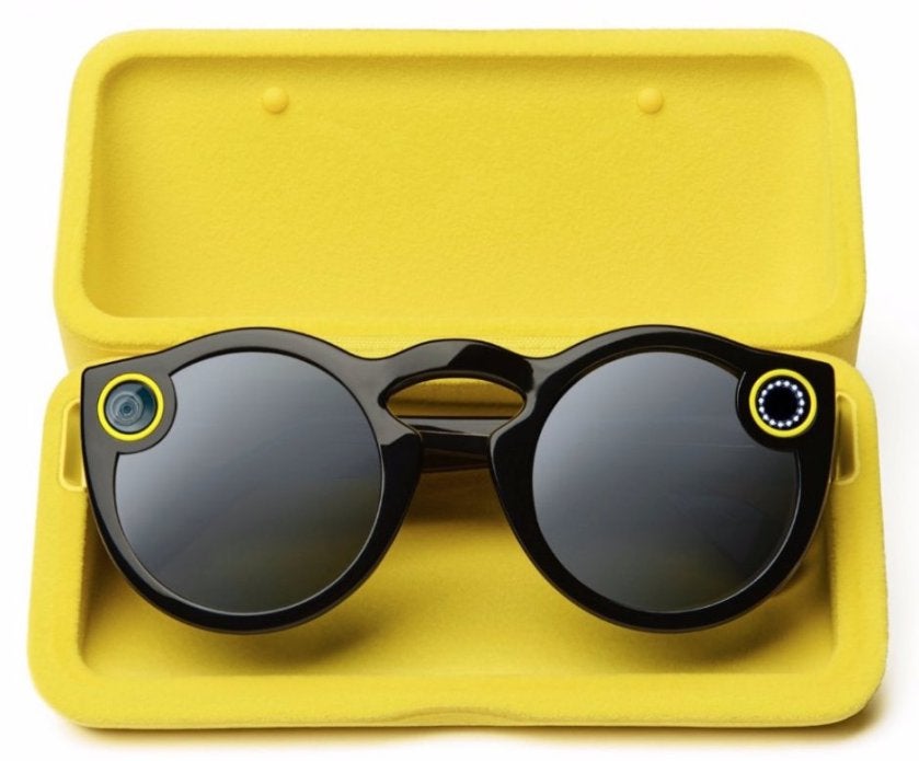 Snap&#039;s Spectacles; note the camera on the right lens and the recording light on the left - Snapchat changes corporate name, introduces new video recording sunglasses