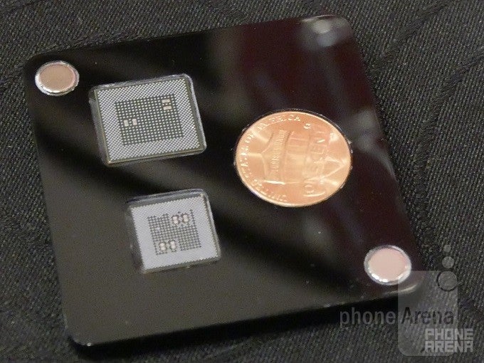 Up top, the Snapdragon 820. Below, the new Snapdragon 835, and a penny. - We get an up-close look at Qualcomm’s new 835 Snapdragon CPU