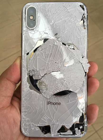 Back glass of an Apple iPhone X is shattered after the phone was dropped - If you don&#039;t put a case on your Apple iPhone X, it could end up looking like this!