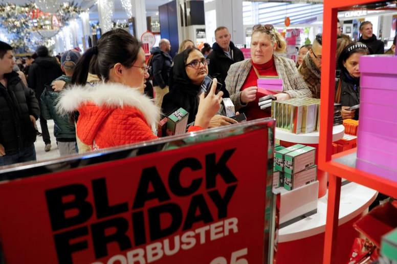 Slowly becoming a rarity, shoppers show up at Macy&#039;s in Herald Square - Mobile shopping expected to drive record online sales figures today for Cyber Monday in the U.S.