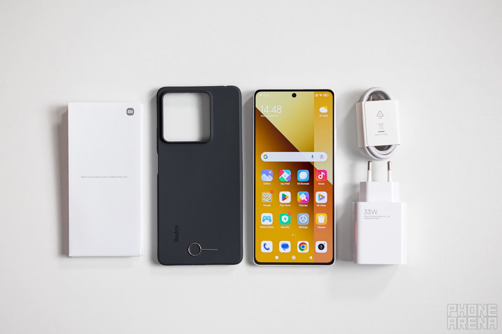 You get a free case and a pre-applied screen protector in the box - Xiaomi Redmi Note 13 5G Review: cool looks on a budget