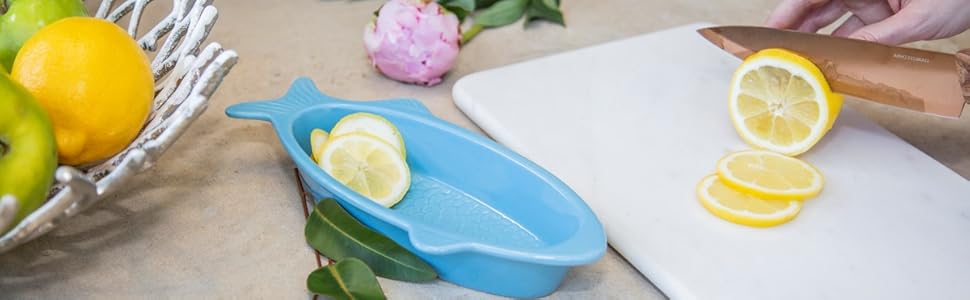 white marble cutting board dip bowl copper knife cambridge fruit bowl basket blue fish lemon apple