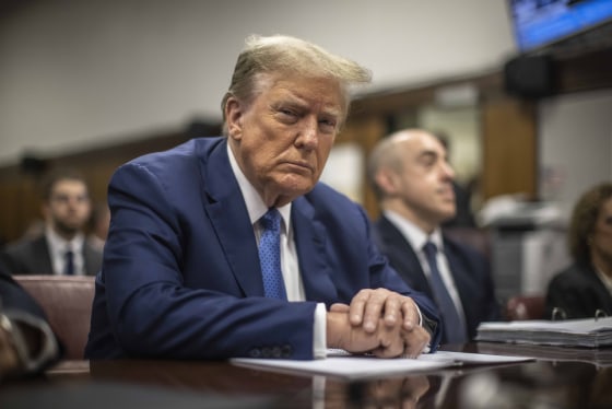 Donald Trump sits in Manhattan Criminal Court