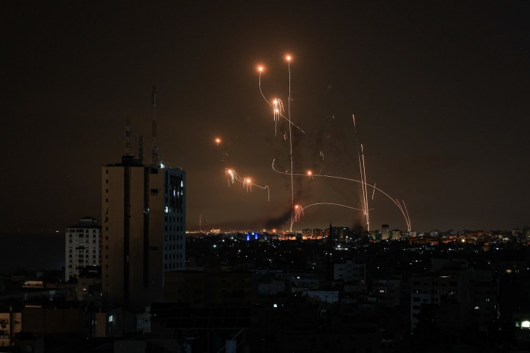 An Israeli missile launched from an Iron Dome system attempts to intercept a rocket