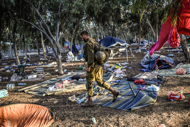 Image: An Israeli soldier patrols on Oct. 12, 2023 near Kibbutz Beeri