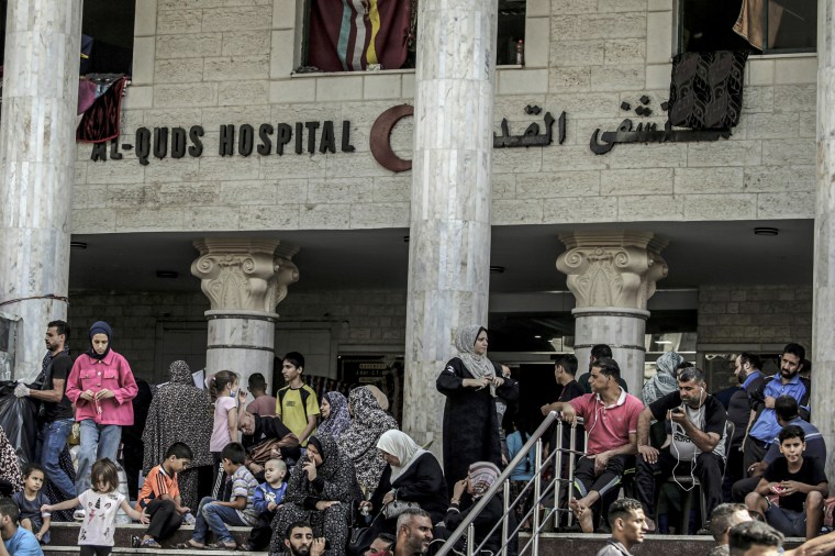 People take shelter at the al-Quds Hospital in Gaza City.