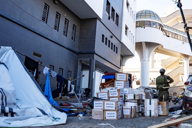 IDF handout of Israeli soldiers delivering aid to Al Shifa hospital in Gaza City