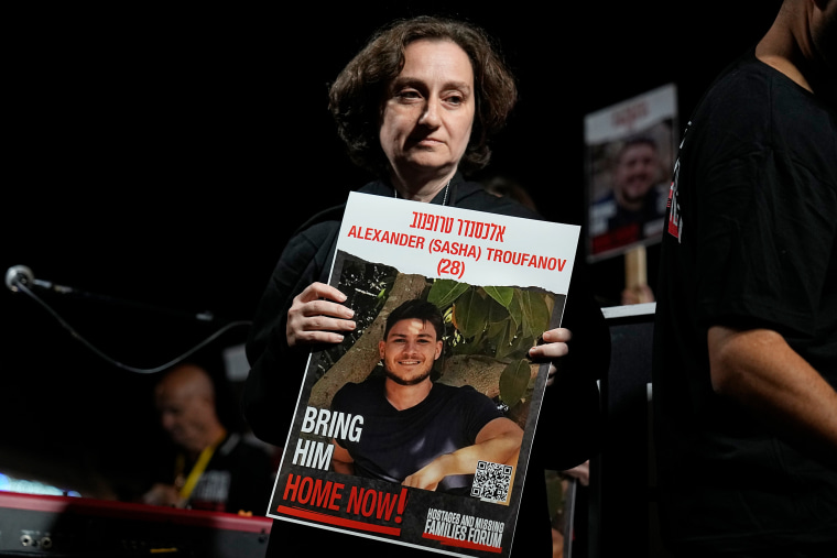 Yelena Trupanov holds a picture of her son, Sasha, at a demonstration in Tel Aviv last week calling for the release of hostages from Gaza.