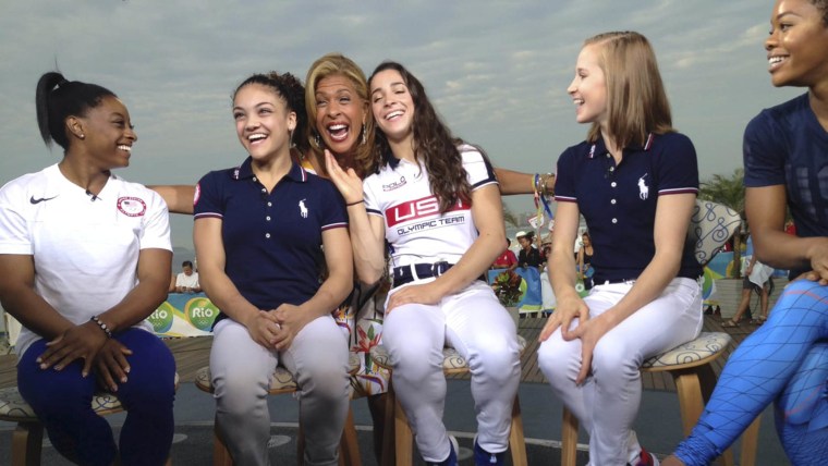 Hoda Kotb poses with the U.S. women's gymnastics team.