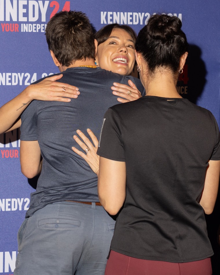 Nicole Shanahan hugs a campaign rally attendee