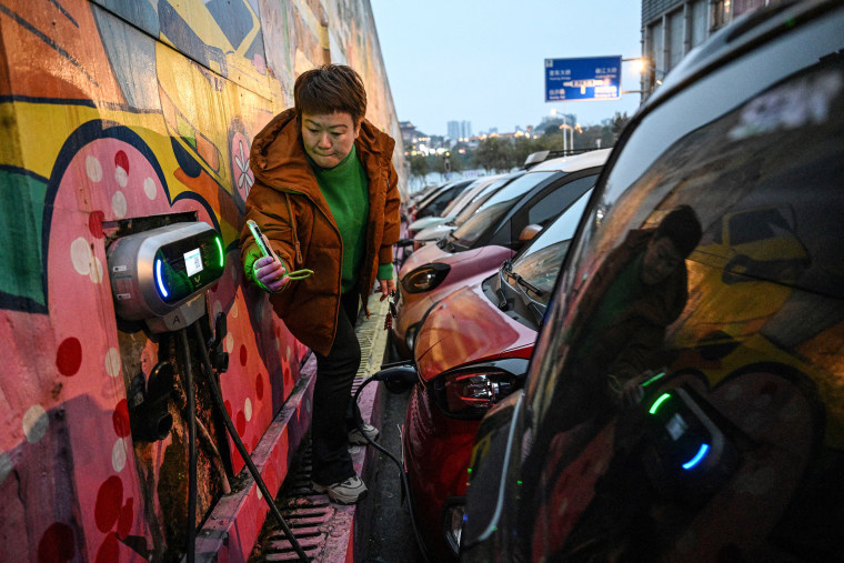 Tiny electric cars weave through traffic in southern China, their cheap and cheerful designs bringing a touch of colour to the EV revolution in the country's overlooked cities. 