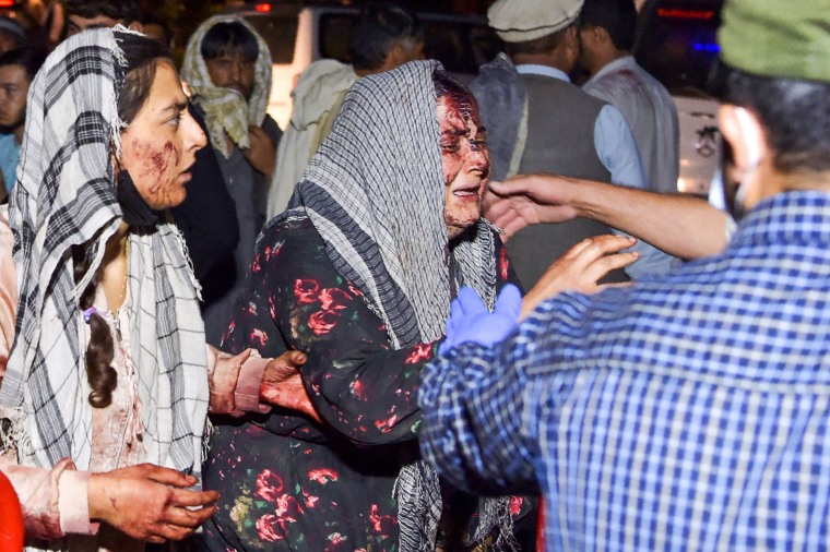 Wounded people arrive at the hospital to be treated