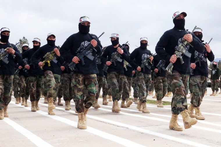 New recruits marching while holding arms