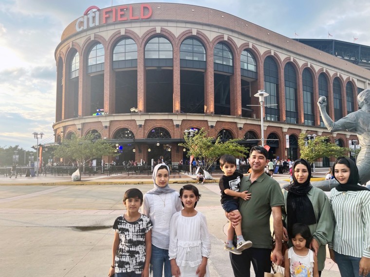 Zahra Shahnoory and her family in front of Citi Field