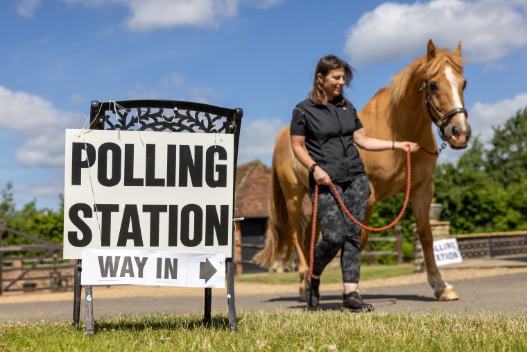 UK Voters Head To The Polls In The General Election